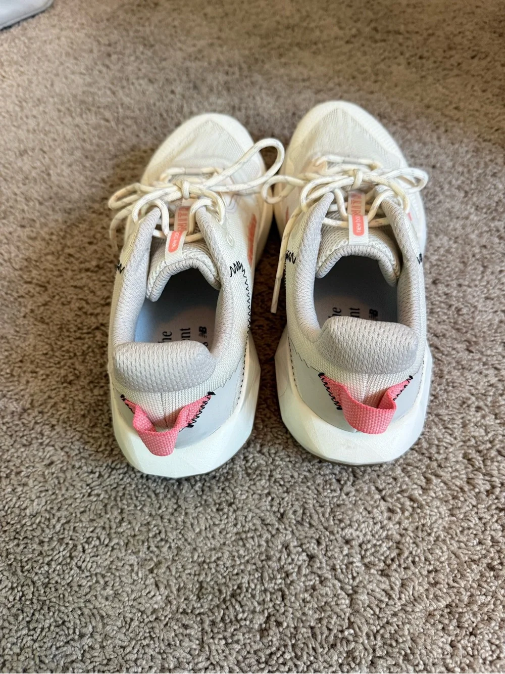 New Balance Women's Cream Athletic Sneakers with Pink Accents